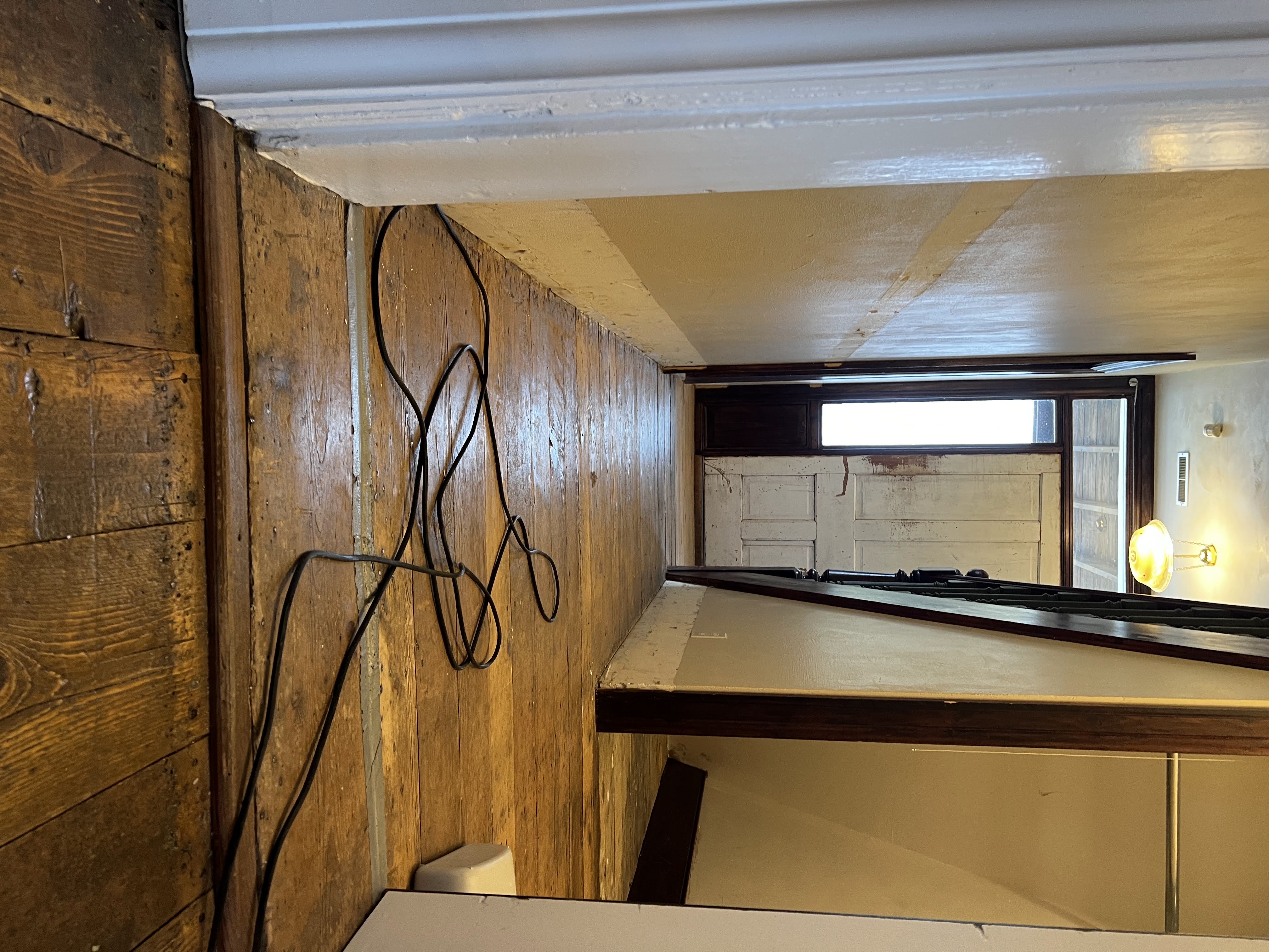 Main room of the pioneer home with the original 1878 flooring still installed