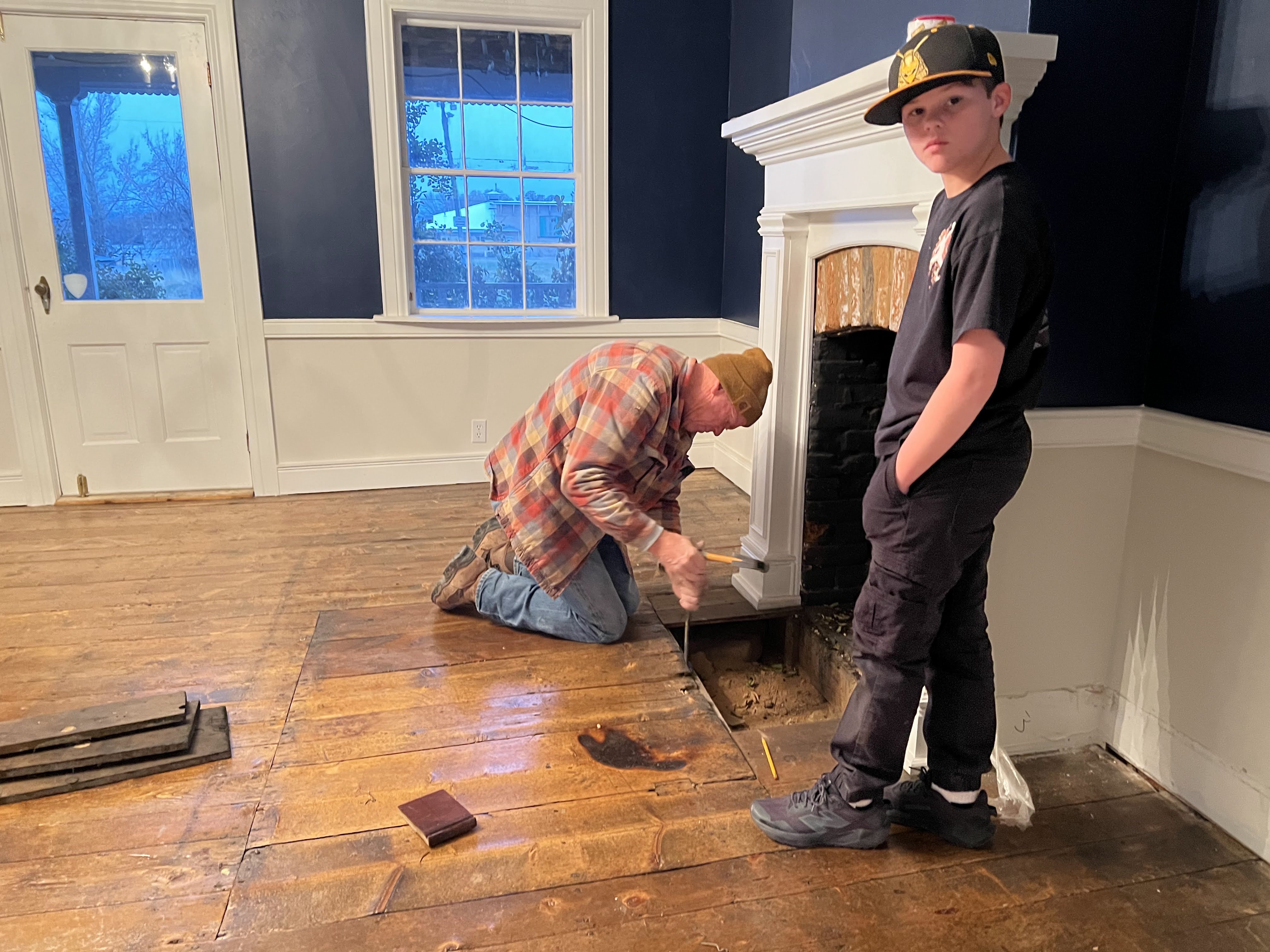 Board being pried up during the removal process